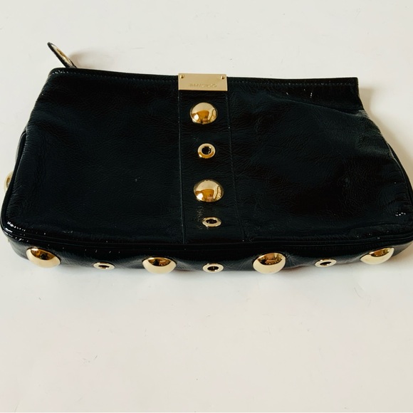 Jimmy Choo black patent leather clutch with gold colored studs